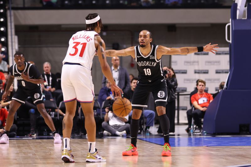 OCEANSIDE, CALIFORNIA - OCTOBER 08: Amari Bailey #10 of the Brooklyn Nets defends against Alondes Williams #15 of the Los Angeles Clippers in the fourth quarter at Frontwave Arena on October 08, 2024 in Oceanside, California. NOTE TO USER: User expressly acknowledges and agrees that, by downloading and or using this photograph, User is consenting to the terms and conditions of the Getty Images License Agreement. (Photo by Joe Scarnici/Getty Images)