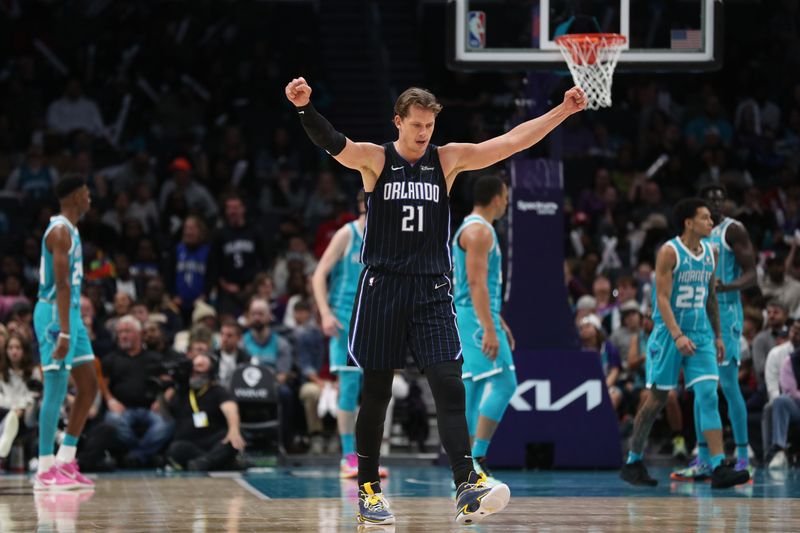 CHARLOTTE, NC - APRIL 5:  Moritz Wagner #21 of the Orlando Magic reacts during the game against the Charlotte Hornets on April 5, 2024 at Spectrum Center in Charlotte, North Carolina. NOTE TO USER: User expressly acknowledges and agrees that, by downloading and or using this photograph, User is consenting to the terms and conditions of the Getty Images License Agreement.  Mandatory Copyright Notice:  Copyright 2024 NBAE (Photo by Brock Williams-Smith/NBAE via Getty Images)