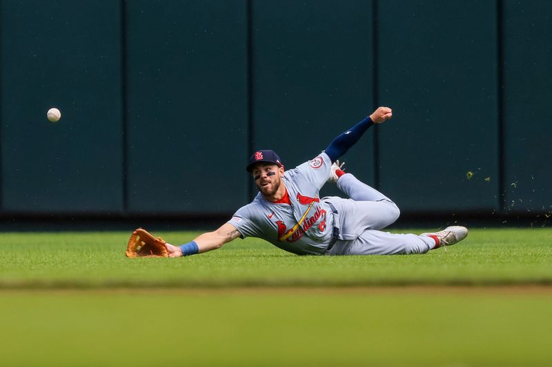 May 29, 2024; Cincinnati, Ohio, USA; St. Louis Cardinals outfielder Michael Siani (63) attempts to catch a fly out hit by Cincinnati Reds designated hitter Nick Martini (not pictured) in the seventh inning at Great American Ball Park. Mandatory Credit: Katie Stratman-USA TODAY Sports