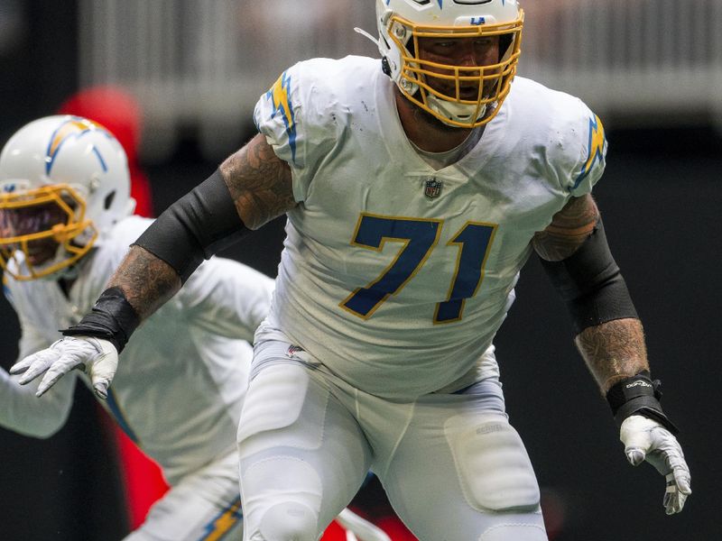 Los Angeles Chargers guard Matt Feiler (71) works during the first half of an NFL football game against the Atlanta Falcons, Sunday, Nov. 6, 2022, in Atlanta. The Los Angeles Chargers won 20-17. (AP Photo/Danny Karnik)