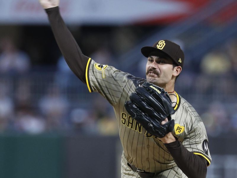 Aug 6, 2024; Pittsburgh, Pennsylvania, USA;  San Diego Padres starting pitcher Dylan Cease (84) delivers a pitch against the Pittsburgh Pirates during the first inning at PNC Park. Mandatory Credit: Charles LeClaire-USA TODAY Sports