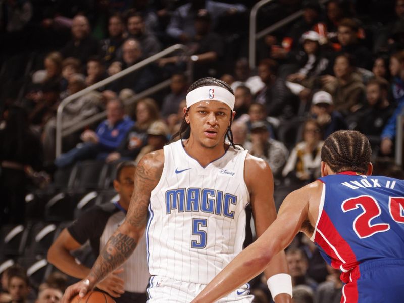 DETROIT, MI - FEBRUARY 4: Paolo Banchero #5 of the Orlando Magic looks on during the game against the Detroit Pistons on February 4, 2024 at Little Caesars Arena in Detroit, Michigan. NOTE TO USER: User expressly acknowledges and agrees that, by downloading and/or using this photograph, User is consenting to the terms and conditions of the Getty Images License Agreement. Mandatory Copyright Notice: Copyright 2024 NBAE (Photo by Brian Sevald/NBAE via Getty Images)