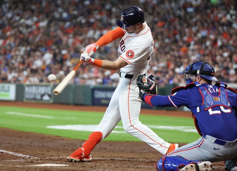 Apr 13, 2024; Houston, Texas, USA;  Houston Astros right fielder Kyle Tucker (30) hits a RBI double against the Texas Rangers in the fifth inning at Minute Maid Park. Mandatory Credit: Thomas Shea-USA TODAY Sports