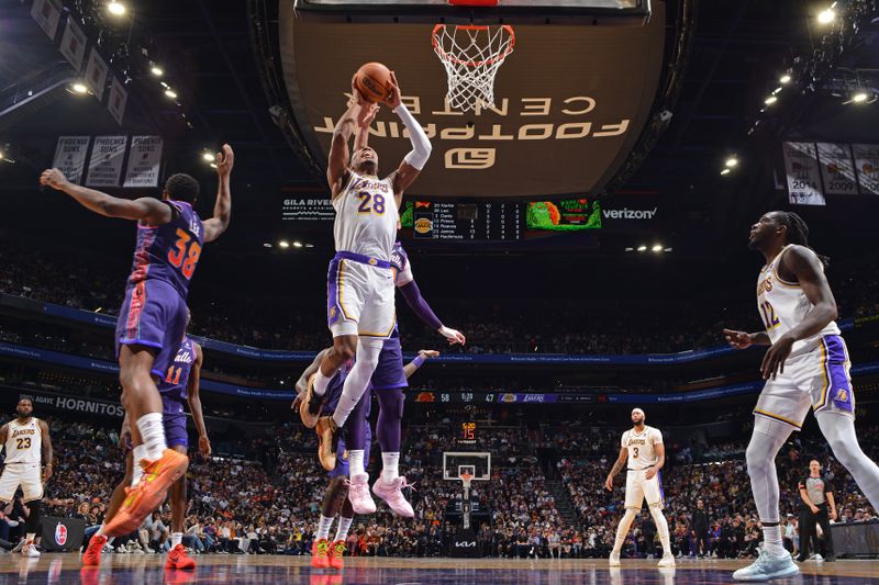 PHOENIX, AZ - FEBRUARY 25: Rui Hachimura #28 of the Los Angeles Lakers drives to the basket during the game against the Phoenix Suns on February 25, 2024 at Footprint Center in Phoenix, Arizona. NOTE TO USER: User expressly acknowledges and agrees that, by downloading and or using this photograph, user is consenting to the terms and conditions of the Getty Images License Agreement. Mandatory Copyright Notice: Copyright 2024 NBAE (Photo by Barry Gossage/NBAE via Getty Images)