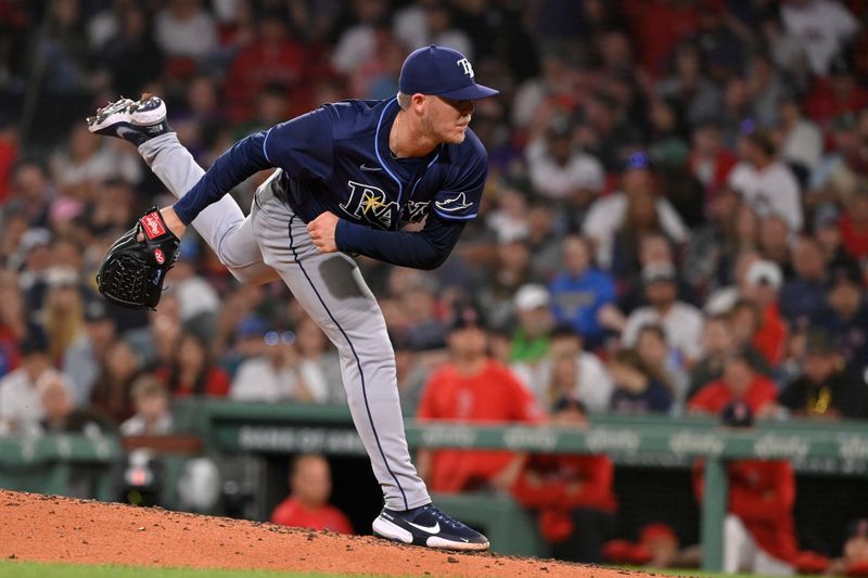 May 14, 2024; Boston, Massachusetts, USA; Tampa Bay Rays pitcher Garrett Cleavinger (60) pitches against the Boston Red Sox during the eighth inning at Fenway Park. Mandatory Credit: Eric Canha-USA TODAY Sports