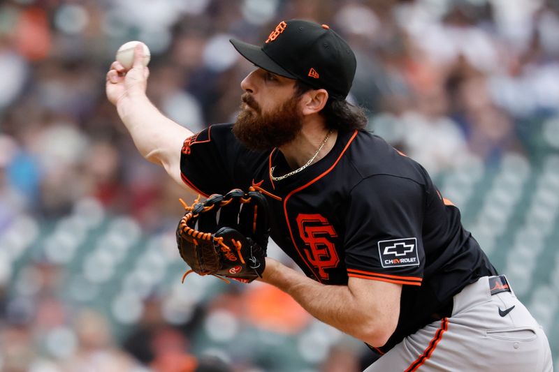 May 28, 2025; Detroit, Michigan, USA;  San Francisco Giants pitcher Ryan Walker (74) pitches in the eighth inning against the Detroit Tigers at Comerica Park. Mandatory Credit: Rick Osentoski-Imagn Images
