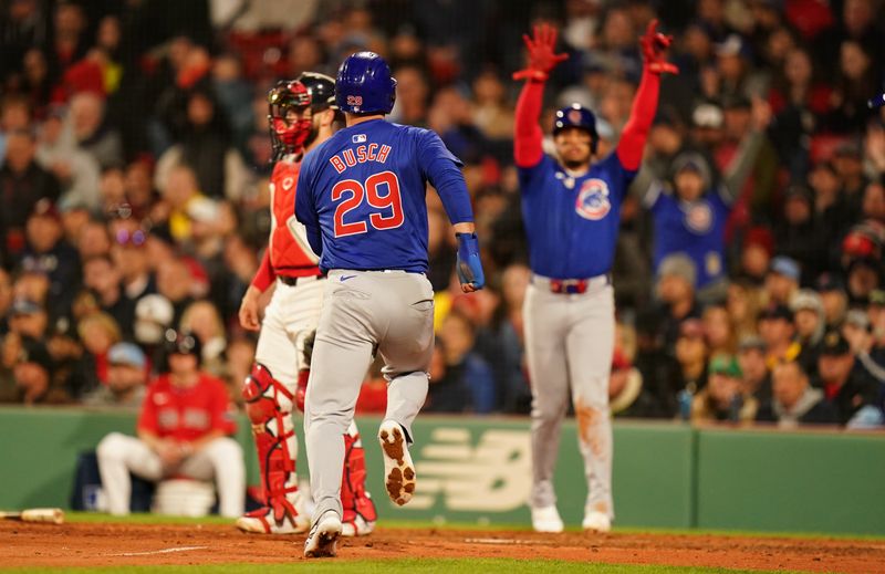 Apr 26, 2024; Boston, Massachusetts, USA; Chicago Cubs first baseman Michael Busch (29) scores against the Boston Red Sox in the seventh inning at Fenway Park. Mandatory Credit: David Butler II-USA TODAY Sports