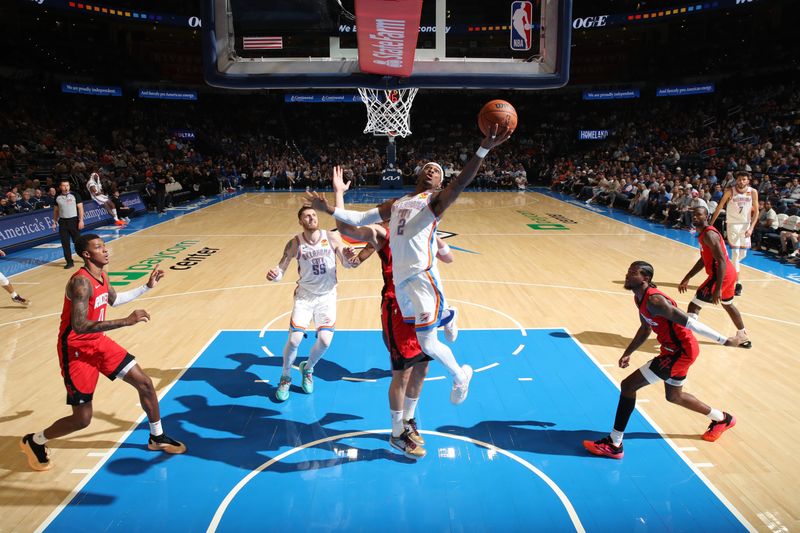 OKLAHOMA CITY, OK - OCTOBER 9: Shai Gilgeous-Alexander #2 of the Oklahoma City Thunder shoots the ball during the game against the Houston Rockets during a NBA pre season game on October 9, 2024 at Paycom Center in Oklahoma City, Oklahoma. NOTE TO USER: User expressly acknowledges and agrees that, by downloading and or using this photograph, User is consenting to the terms and conditions of the Getty Images License Agreement. Mandatory Copyright Notice: Copyright 2024 NBAE (Photo by Zach Beeker/NBAE via Getty Images)