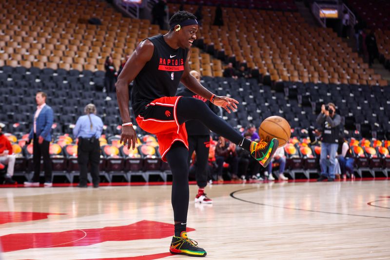 TORONTO, CANADA - MARCH 14: Pascal Siakam #43 of the Toronto Raptors smiles before the game against the Denver Nuggets on March 14, 2023 at the Scotiabank Arena in Toronto, Ontario, Canada.  NOTE TO USER: User expressly acknowledges and agrees that, by downloading and or using this Photograph, user is consenting to the terms and conditions of the Getty Images License Agreement.  Mandatory Copyright Notice: Copyright 2023 NBAE (Photo by Vaughn Ridley/NBAE via Getty Images)