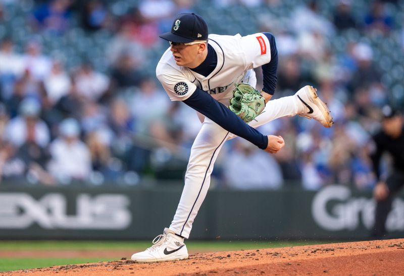 May 27, 2025; Seattle, Washington, USA;  Seattle Mariners starter Logan Evans (73) delivers a pitch during the fourth inning against the Washington Nationals at T-Mobile Park. Mandatory Credit: Stephen Brashear-Imagn Images