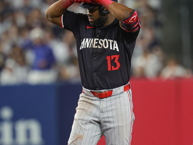 Jun 5, 2024; Bronx, New York, USA; Minnesota Twins right fielder Manuel Margot (13) reacts after a double during the sixth inning against the New York Yankees at Yankee Stadium. Mandatory Credit: Vincent Carchietta-USA TODAY Sports