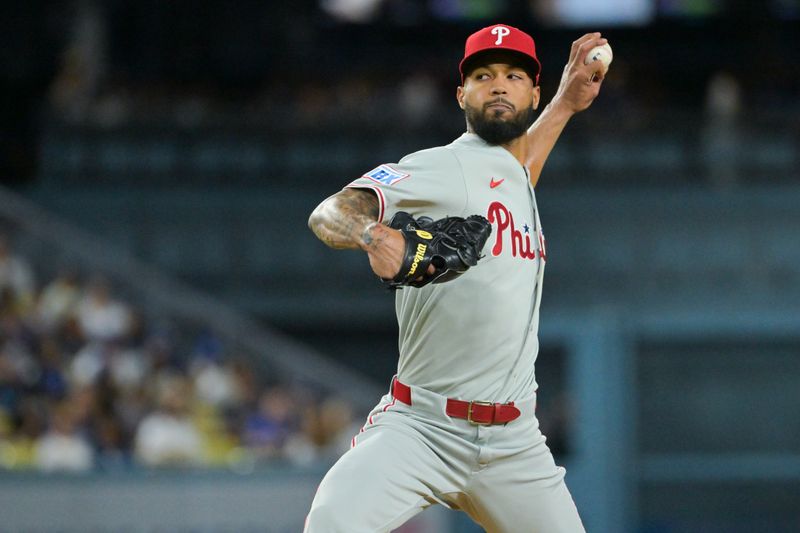 Sep 16, 2025; Los Angeles, California, USA; Philadelphia Phillies starting pitcher Cristopher Sanchez (61) delivers a pitch during the second inning against the Los Angeles Dodgers at Dodger Stadium. Mandatory Credit: Jayne Kamin-Oncea-Imagn Images