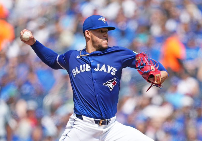 May 20, 2024; Toronto, Ontario, CAN; Toronto Blue Jays starting pitcher José Berrios (17) throws a pitch against the Chicago White Sox during the first inning at Rogers Centre. Mandatory Credit: Nick Turchiaro-USA TODAY Sports