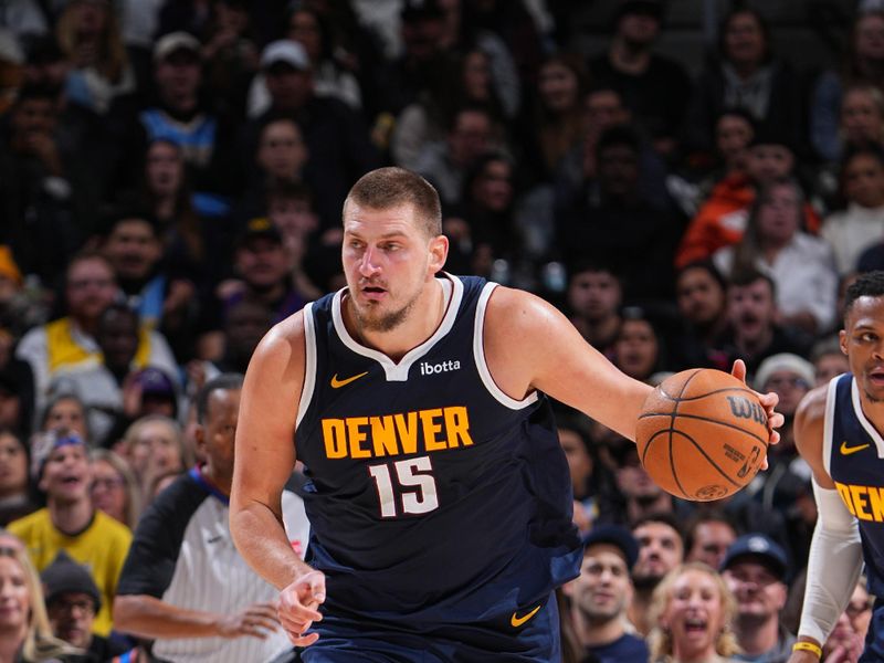 DENVER, CO - NOVEMBER 6: Nikola Jokic #15 of the Denver Nuggets dribbles the ball during the game against the Oklahoma City Thunder on November 6, 2024 at Ball Arena in Denver, Colorado. NOTE TO USER: User expressly acknowledges and agrees that, by downloading and/or using this Photograph, user is consenting to the terms and conditions of the Getty Images License Agreement. Mandatory Copyright Notice: Copyright 2024 NBAE (Photo by Garrett Ellwood/NBAE via Getty Images)