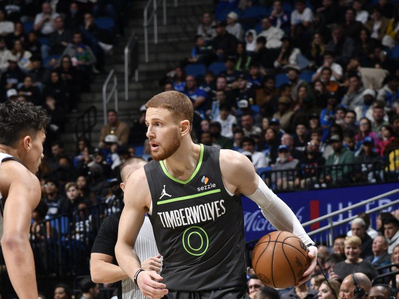 ORLANDO, FL - JANUARY 9: Donte DiVincenzo #0 of the Minnesota Timberwolves handles the ball during the game against the Orlando Magic on January 9, 2025 at Kia Center in Orlando, Florida. NOTE TO USER: User expressly acknowledges and agrees that, by downloading and or using this photograph, User is consenting to the terms and conditions of the Getty Images License Agreement. Mandatory Copyright Notice: Copyright 2025 NBAE (Photo by Fernando Medina/NBAE via Getty Images)