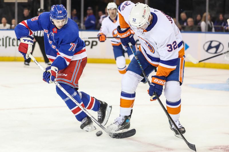 Sep 26, 2023; New York, New York, USA;  New York Rangers left wing Brennan Othmann (78) and New York Islanders left wing Ross Johnston (32) battle for control of the puck in the third period at Madison Square Garden. Mandatory Credit: Wendell Cruz-USA TODAY Sports