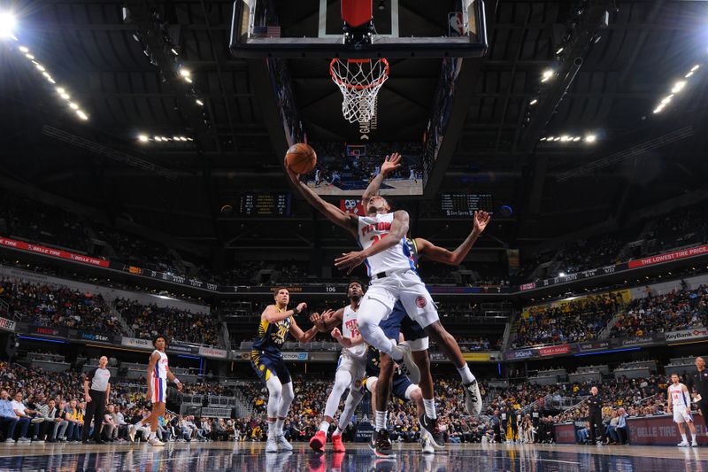 INDIANAPOLIS, IN - FEBRUARY 22:  Marcus Sasser #25 of the Detroit Pistons goes to the basket during the game on February 22, 2024 at Gainbridge Fieldhouse in Indianapolis, Indiana. NOTE TO USER: User expressly acknowledges and agrees that, by downloading and or using this Photograph, user is consenting to the terms and conditions of the Getty Images License Agreement. Mandatory Copyright Notice: Copyright 2024 NBAE (Photo by Ron Hoskins/NBAE via Getty Images)