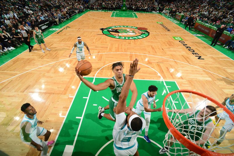 BOSTON, MA - APRIL 12:  Jaden Springer #44 of the Boston Celtics drives to the basket during the game against the Charlotte Hornets on April 12, 2024 at the TD Garden in Boston, Massachusetts. NOTE TO USER: User expressly acknowledges and agrees that, by downloading and or using this photograph, User is consenting to the terms and conditions of the Getty Images License Agreement. Mandatory Copyright Notice: Copyright 2024 NBAE  (Photo by Brian Babineau/NBAE via Getty Images)