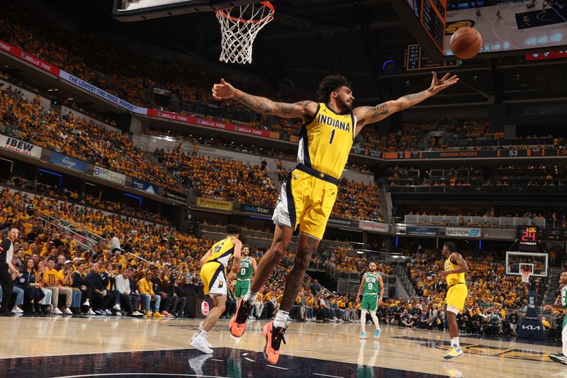 INDIANAPOLIS, IN - MAY 27: Obi Toppin #1 of the Indiana Pacers rebounds the ball during the game against the Boston Celtics during Game 4 of the Eastern Conference Finals of the 2024 NBA Playoffs on May 27, 2024 at Gainbridge Fieldhouse in Indianapolis, Indiana. NOTE TO USER: User expressly acknowledges and agrees that, by downloading and or using this Photograph, user is consenting to the terms and conditions of the Getty Images License Agreement. Mandatory Copyright Notice: Copyright 2024 NBAE (Photo by Nathaniel S. Butler/NBAE via Getty Images)