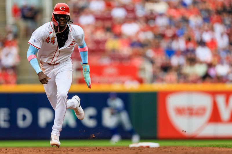 May 26, 2024; Cincinnati, Ohio, USA; Cincinnati Reds shortstop Elly De La Cruz (44) runs to third on a single hit by outfielder Jake Fraley (not pictured) in the third inning against the Los Angeles Dodgers at Great American Ball Park. Mandatory Credit: Katie Stratman-USA TODAY Sports