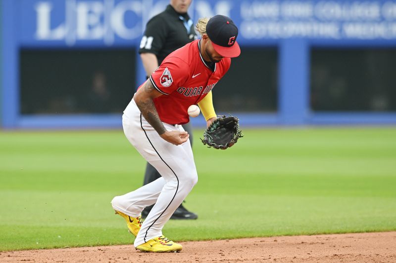 Jun 8, 2025; Cleveland, Ohio, USA; Cleveland Guardians shortstop Gabriel Arias (13) fields a ball hit by Houston Astros second baseman Shay Whitcomb (not pictured) during the sixth inning at Progressive Field. Mandatory Credit: Ken Blaze-Imagn Images