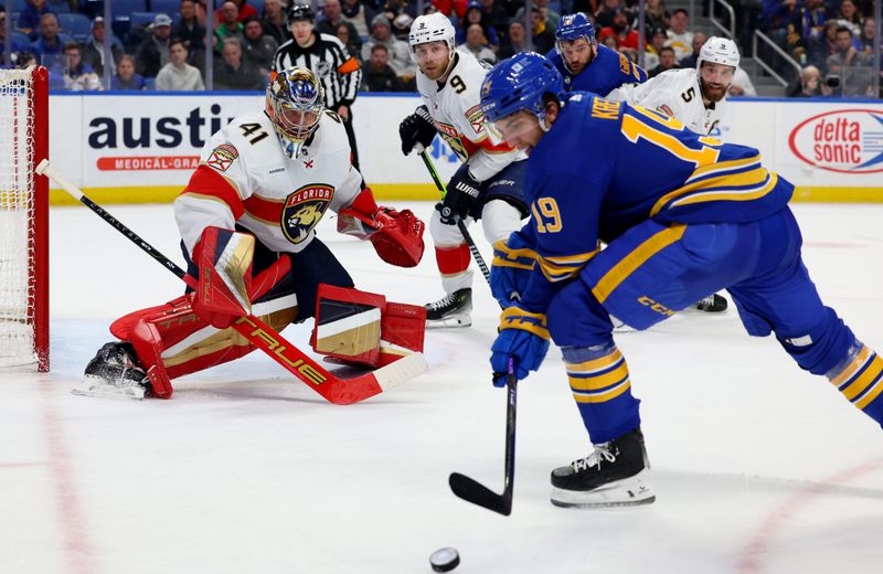 Feb 15, 2024; Buffalo, New York, USA;  Buffalo Sabres center Peyton Krebs (19) looks to take a shot on Florida Panthers goaltender Anthony Stolarz (41) during the second period at KeyBank Center. Mandatory Credit: Timothy T. Ludwig-USA TODAY Sports