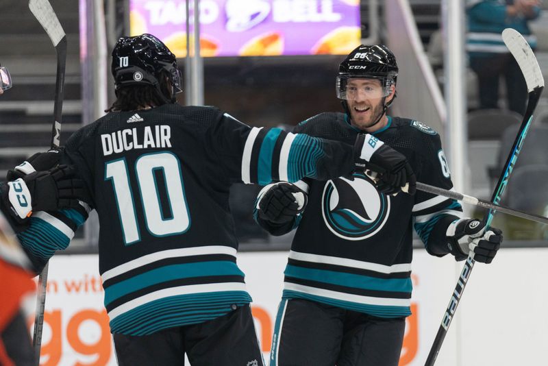 Feb 29, 2024; San Jose, California, USA;  San Jose Sharks center Mike Hoffman (68) celebrates with left wing Anthony Duclair (10) during the second period against the Anaheim Ducks at SAP Center at San Jose. Mandatory Credit: Stan Szeto-USA TODAY Sports