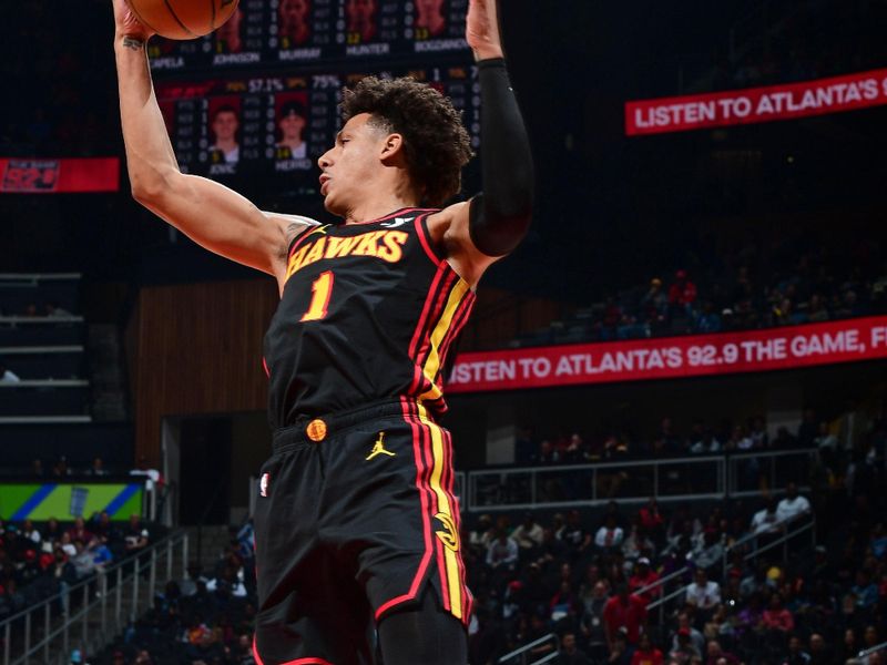 ATLANTA, GA - APRIL 9: Jalen Johnson #1 of the Atlanta Hawks grabs a rebound during the game against the Miami Heat on April 9, 2024 at State Farm Arena in Atlanta, Georgia.  NOTE TO USER: User expressly acknowledges and agrees that, by downloading and/or using this Photograph, user is consenting to the terms and conditions of the Getty Images License Agreement. Mandatory Copyright Notice: Copyright 2024 NBAE (Photo by Scott Cunningham/NBAE via Getty Images)