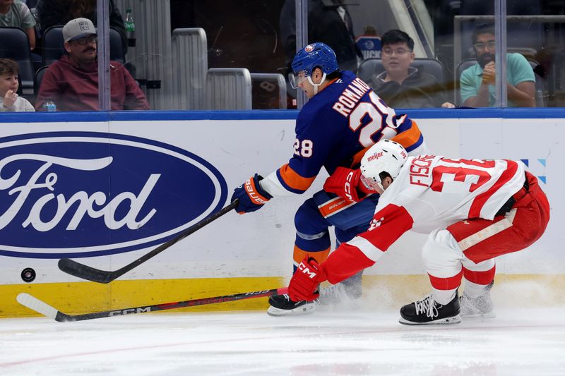 Oct 22, 2024; Elmont, New York, USA; New York Islanders defenseman Alexander Romanov (28) and Detroit Red Wings right wing Christian Fischer (36) fight for the puck during the third period at UBS Arena. Mandatory Credit: Brad Penner-Imagn Images