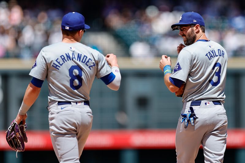 Jun 20, 2024; Denver, Colorado, USA; Los Angeles Dodgers third baseman Kike Hernandez (8) and second baseman Chris Taylor (3) in the fifth inning against the Colorado Rockies at Coors Field. Mandatory Credit: Isaiah J. Downing-USA TODAY Sports