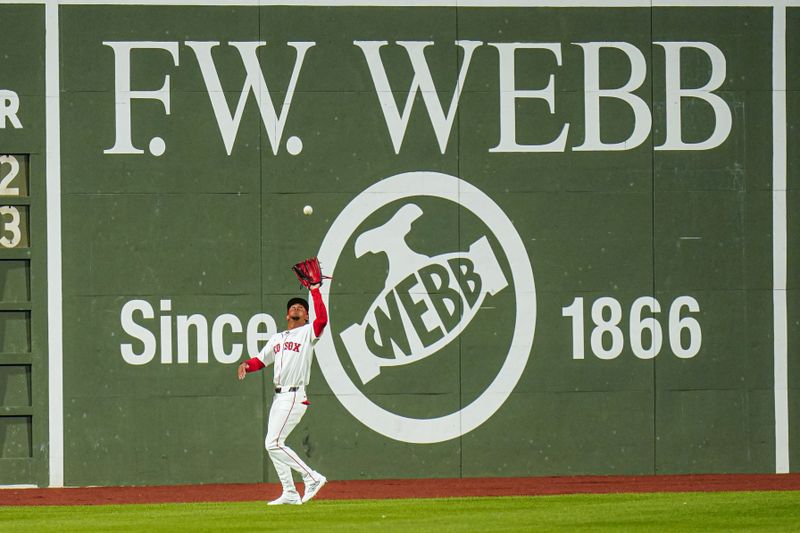 Apr 10, 2024; Boston, Massachusetts, USA; Boston Red Sox outfielder Ceddanne Rafaela (43) makers the catch against the Baltimore Orioles in the first inning at Fenway Park. Mandatory Credit: David Butler II-USA TODAY Sports