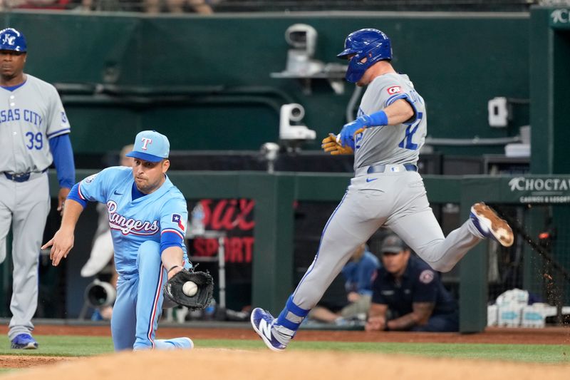 Jun 23, 2024; Arlington, Texas, USA; Texas Rangers first baseman Nathaniel Lowe (30) forces out Kansas City Royals second baseman Nick Loftin (12) during the sixth inning at Globe Life Field. Mandatory Credit: Jim Cowsert-USA TODAY Sports