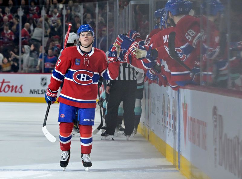 Oct 29, 2024; Montreal, Quebec, CAN; Montreal Canadiens forward Cole Caufield (13) celebrates with teammates after scoring a goal against the Seattle Kraken during the first period at the Bell Centre. Mandatory Credit: Eric Bolte-Imagn Images