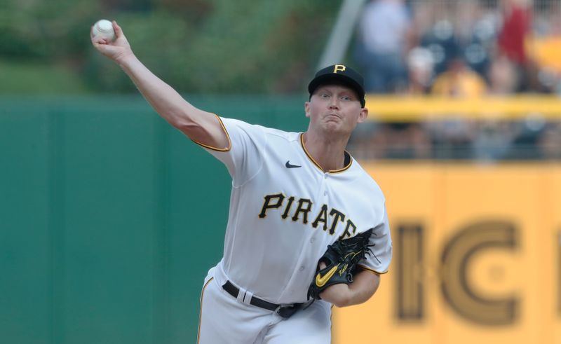 Jun 6, 2023; Pittsburgh, Pennsylvania, USA;  Pittsburgh Pirates starting pitcher Mitch Keller (23) delivers a pitch against the Oakland Athletics during the first inning at PNC Park. Mandatory Credit: Charles LeClaire-USA TODAY Sports