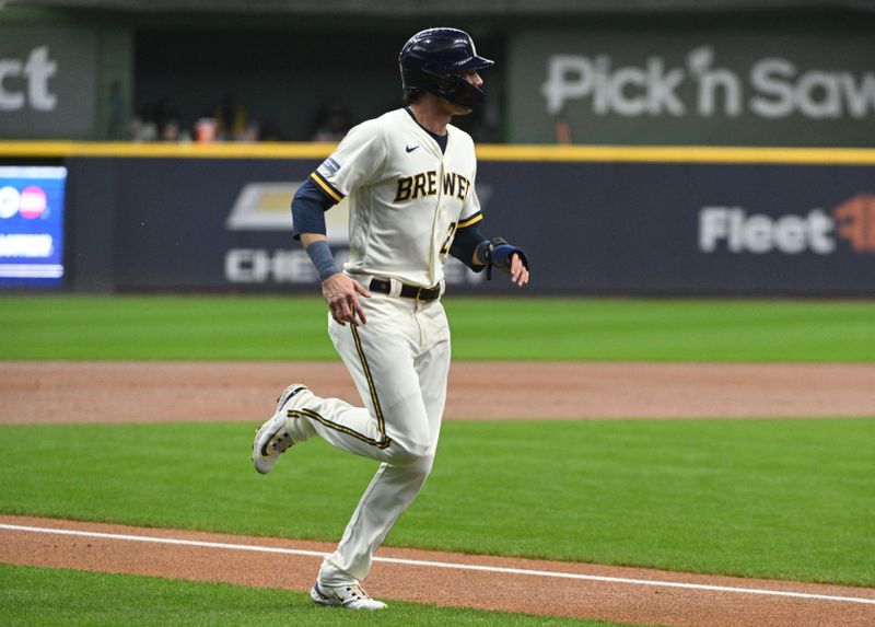 Sep 28, 2023; Milwaukee, Wisconsin, USA; Milwaukee Brewers left fielder Christian Yelich (22) scores against the St. Louis Cardinals in the first inning at American Family Field. Mandatory Credit: Michael McLoone-USA TODAY Sports