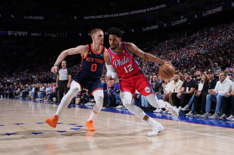 PHILADELPHIA, PA - APRIL 28: Tobias Harris #12 of the Philadelphia 76ers dribbles the ball during the game against the New York Knicks during Round 1 Game 4 of the 2024 NBA Playoffs on April 28, 2024 at the Wells Fargo Center in Philadelphia, Pennsylvania NOTE TO USER: User expressly acknowledges and agrees that, by downloading and/or using this Photograph, user is consenting to the terms and conditions of the Getty Images License Agreement. Mandatory Copyright Notice: Copyright 2024 NBAE (Photo by Jesse D. Garrabrant/NBAE via Getty Images)