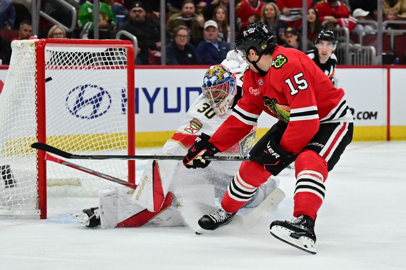 Nov 21, 2024; Chicago, Illinois, USA; Chicago Blackhawks center Craig Smith (15) scores past Florida Panthers goaltender Spencer Knight (30) during the second period at the United Center. Mandatory Credit: Daniel Bartel-Imagn Images