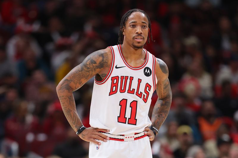 CHICAGO, ILLINOIS - NOVEMBER 06: DeMar DeRozan #11 of the Chicago Bulls looks on against the Utah Jazz during the first half at the United Center on November 06, 2023 in Chicago, Illinois. NOTE TO USER: User expressly acknowledges and agrees that, by downloading and or using this photograph, User is consenting to the terms and conditions of the Getty Images License Agreement. (Photo by Michael Reaves/Getty Images)