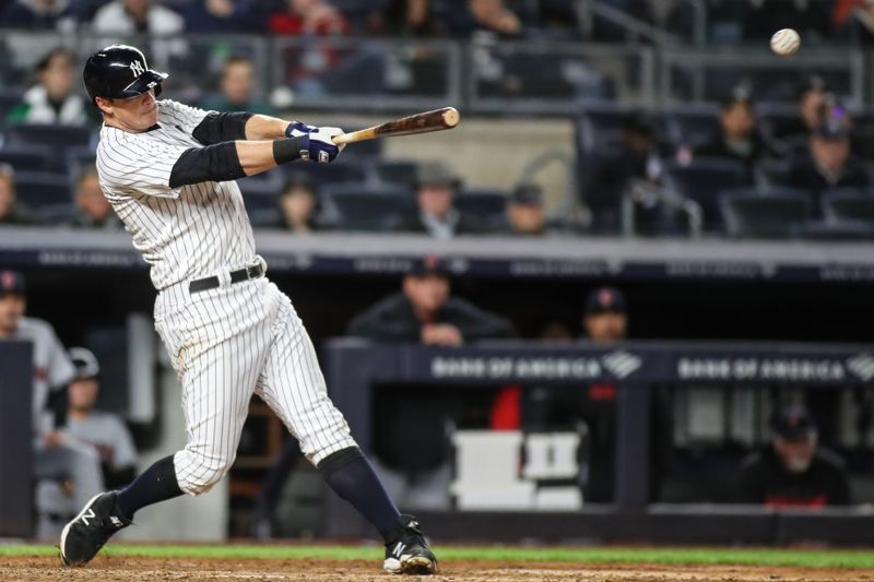 May 2, 2023; Bronx, New York, USA;  New York Yankees third baseman DJ LeMahieu (26) hits a RBI single in the eighth inning against the Cleveland Guardians at Yankee Stadium. Mandatory Credit: Wendell Cruz-USA TODAY Sports