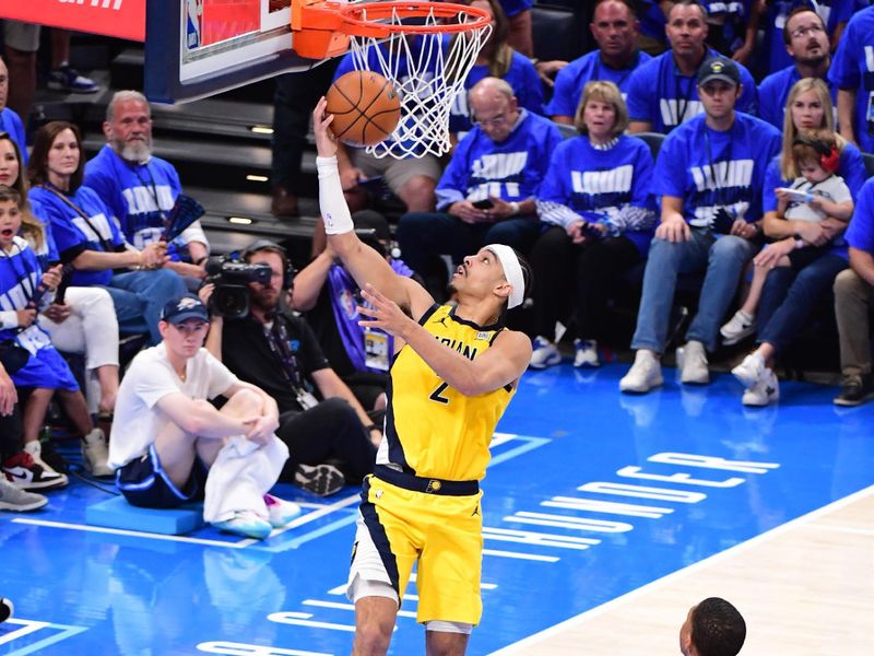 OKLAHOMA CITY, OK - JUNE 8: Andrew Nembhard #2 of the Indiana Pacers drives to the basket during the game against the Oklahoma City Thunder during Game Two of the 2025 NBA Finals on June 8, 2025 at Paycom Center in Oklahoma City, Oklahoma. NOTE TO USER: User expressly acknowledges and agrees that, by downloading and or using this photograph, User is consenting to the terms and conditions of the Getty Images License Agreement. Mandatory Copyright Notice: Copyright 2025 NBAE (Photo by Adam Pantozzi/NBAE via Getty Images)