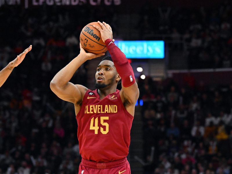 CLEVELAND, OHIO - FEBRUARY 13: Donovan Mitchell #45 of the Cleveland Cavaliers shoots during the fourth quarter against the San Antonio Spurs at Rocket Mortgage Fieldhouse on February 13, 2023 in Cleveland, Ohio. The Cavaliers defeated the Spurs 117-109. NOTE TO USER: User expressly acknowledges and agrees that, by downloading and or using this photograph, User is consenting to the terms and conditions of the Getty Images License Agreement. (Photo by Jason Miller/Getty Images)