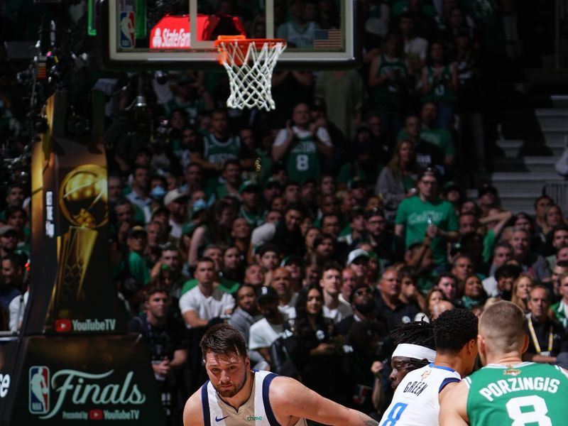 BOSTON, MA - JUNE 17: Luka Doncic #77 of the Dallas Mavericks dribbles the ball during the game against the Boston Celtics during Game 5 of the 2024 NBA Finals on June 17, 2024 at the TD Garden in Boston, Massachusetts. NOTE TO USER: User expressly acknowledges and agrees that, by downloading and or using this photograph, User is consenting to the terms and conditions of the Getty Images License Agreement. Mandatory Copyright Notice: Copyright 2024 NBAE  (Photo by Garrett Ellwood/NBAE via Getty Images)