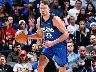 ORLANDO, FL - DECEMBER 20: Franz Wagner #22 of the Orlando Magic dribbles the ball during the game against the Miami Heat on December 20, 2023 at the Kia Center in Orlando, Florida. NOTE TO USER: User expressly acknowledges and agrees that, by downloading and or using this photograph, User is consenting to the terms and conditions of the Getty Images License Agreement. Mandatory Copyright Notice: Copyright 2023 NBAE (Photo by Fernando Medina/NBAE via Getty Images)