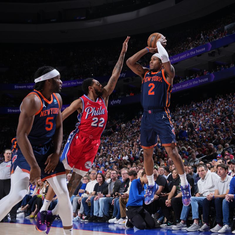 PHILADELPHIA, PA - APRIL 28: Miles McBride #2 of the New York Knicks shoots a three point basket during the game against the Philadelphia 76ers during Round 1 Game 4 of the 2024 NBA Playoffs on April 28, 2024 at the Wells Fargo Center in Philadelphia, Pennsylvania NOTE TO USER: User expressly acknowledges and agrees that, by downloading and/or using this Photograph, user is consenting to the terms and conditions of the Getty Images License Agreement. Mandatory Copyright Notice: Copyright 2024 NBAE (Photo by Jesse D. Garrabrant/NBAE via Getty Images)