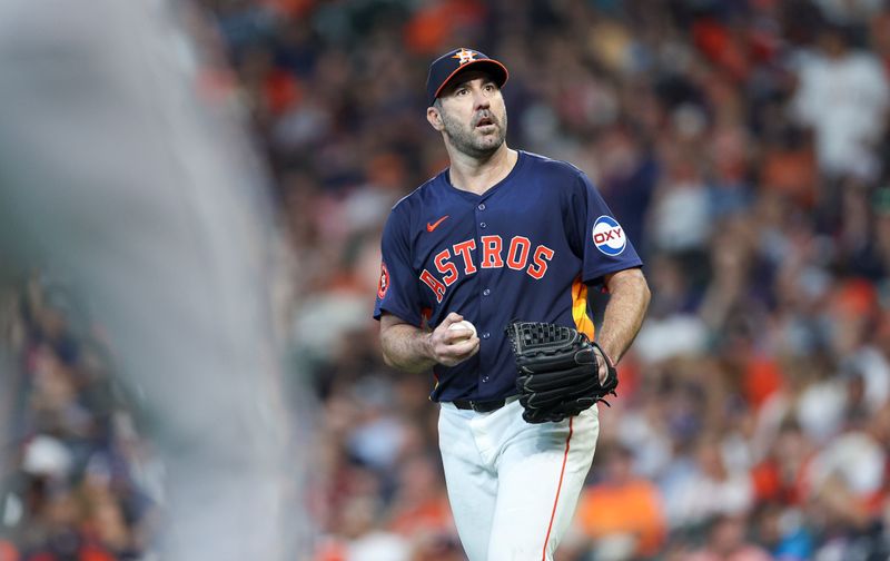 Sep 8, 2024; Houston, Texas, USA; Houston Astros starting pitcher Justin Verlander (35) reacts after a pitch during the third inning against the Arizona Diamondbacks at Minute Maid Park. Mandatory Credit: Troy Taormina-Imagn Images