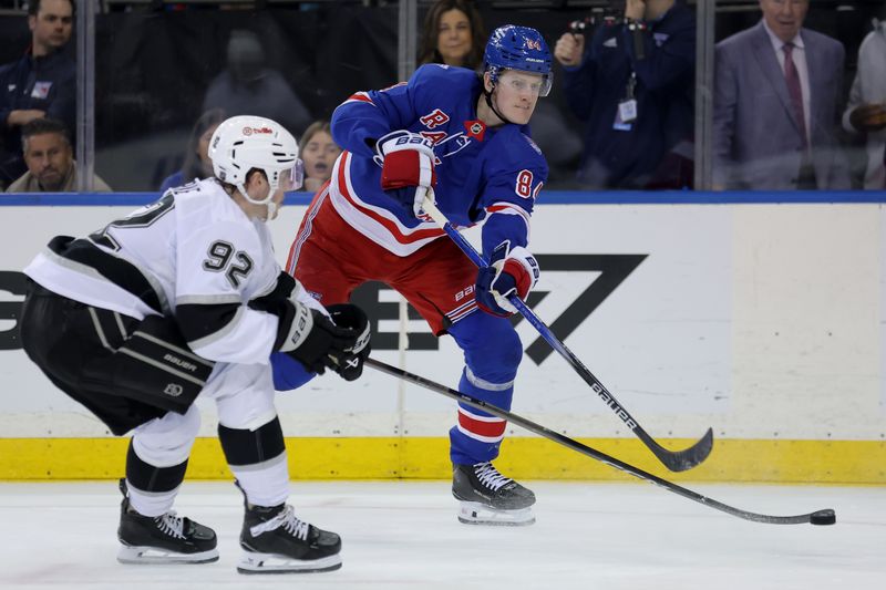 Mar 16, 2026; New York, New York, USA; New York Rangers center Adam Edstrom (84) takes a shot against Los Angeles Kings defenseman Brandt Clarke (92) during the second period at Madison Square Garden. Mandatory Credit: Brad Penner-Imagn Images Mar 16, 2026; New York, New York, USA; New York Rangers center Adam Edstrom (84) takes a shot against Los Angeles Kings defenseman Brandt Clarke (92) during the second period at Madison Square Garden. Mandatory Credit: Brad Penner-Imagn Images