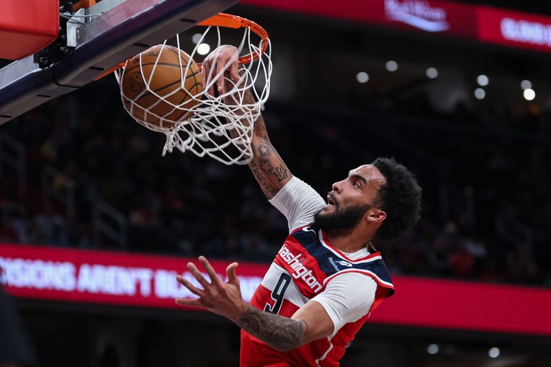 WASHINGTON, DC - JANUARY 01: Justin Champagnie #9 of the Washington Wizards dunks the ball against the Chicago Bulls during the second half at Capital One Arena on January 1, 2025 in Washington, DC. NOTE TO USER: User expressly acknowledges and agrees that, by downloading and or using this photograph, User is consenting to the terms and conditions of the Getty Images License Agreement. (Photo by Scott Taetsch/Getty Images)