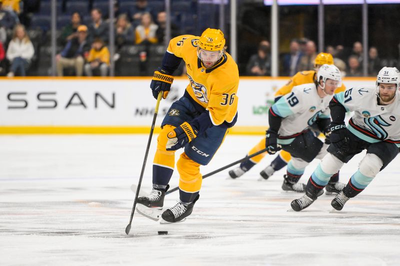 Mar 6, 2025; Nashville, Tennessee, USA;  Nashville Predators left wing Cole Smith (36) skates with the puck against the Seattle Kraken during the first period at Bridgestone Arena. Mandatory Credit: Steve Roberts-Imagn Images