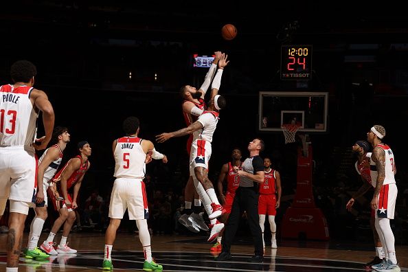 WASHINGTON, DC -? DECEMBER 13:  Daniel Gafford #21 of the Washington Wizards & Jonas Valanciunas #17 of the New Orleans Pelicans during open tip-off on December 13, 2023 at Capital One Arena in Washington, DC. NOTE TO USER: User expressly acknowledges and agrees that, by downloading and or using this Photograph, user is consenting to the terms and conditions of the Getty Images License Agreement. Mandatory Copyright Notice: Copyright 2023 NBAE (Photo by Stephen Gosling/NBAE via Getty Images)