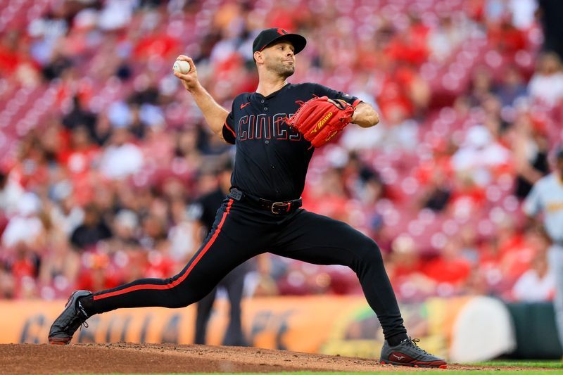 Sep 20, 2024; Cincinnati, Ohio, USA; Cincinnati Reds starting pitcher Nick Martinez (28) pitches against the Pittsburgh Pirates in the second inning at Great American Ball Park. Mandatory Credit: Katie Stratman-Imagn Images